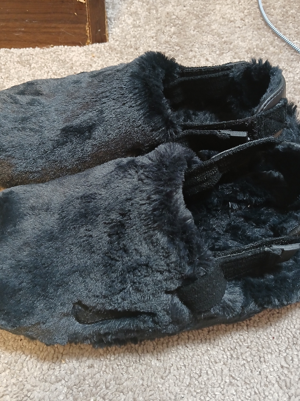 Nike Women's Calm Mule SE slippers in a solid black
